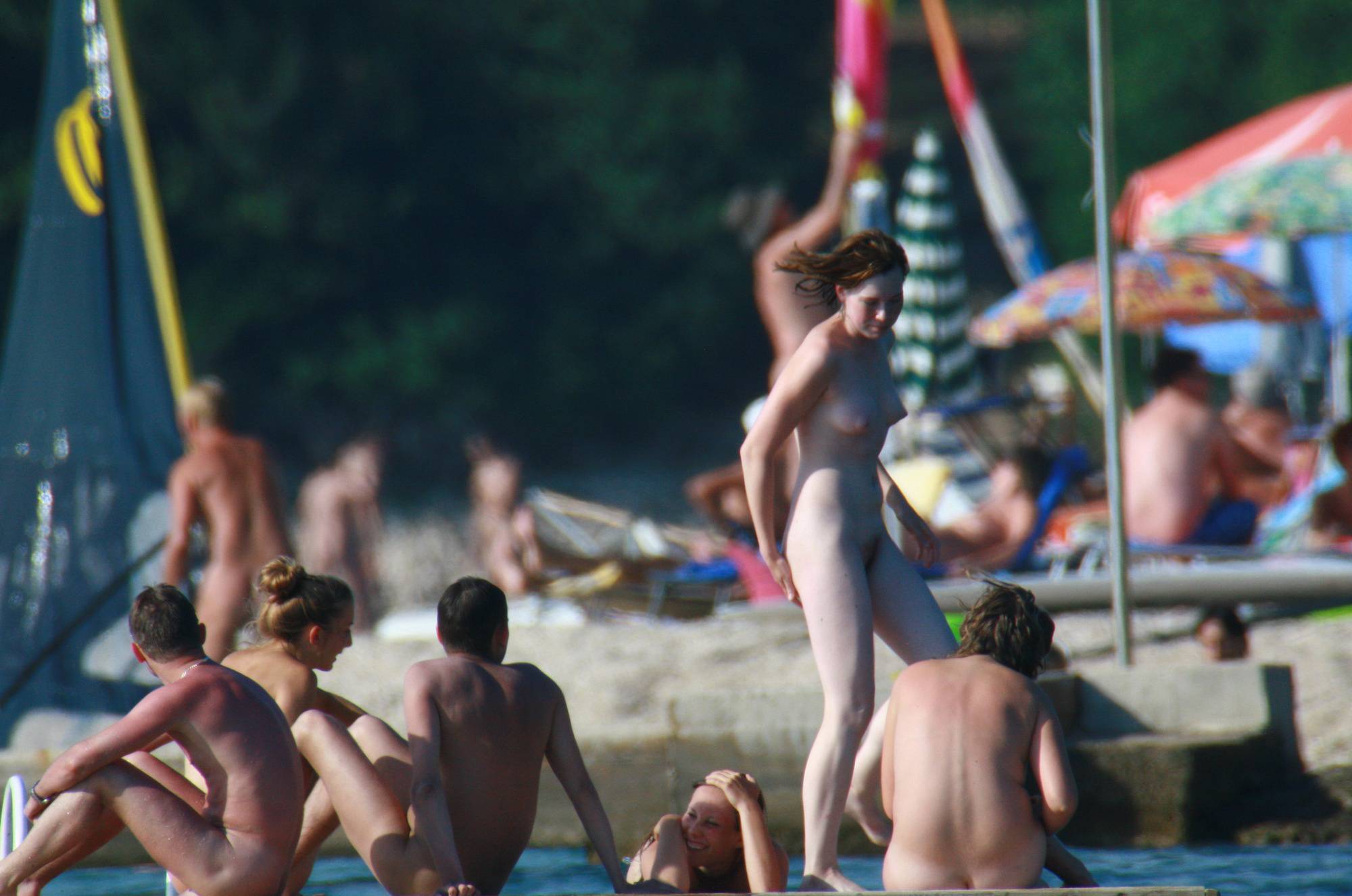 Nudist Slab Group Tanning - 1