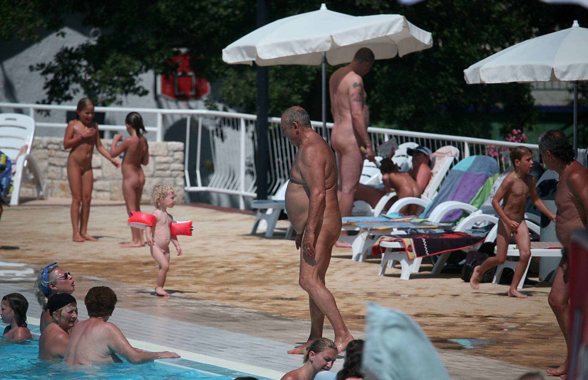 Purenudism Pics Liesurely Pool Strolling - 1