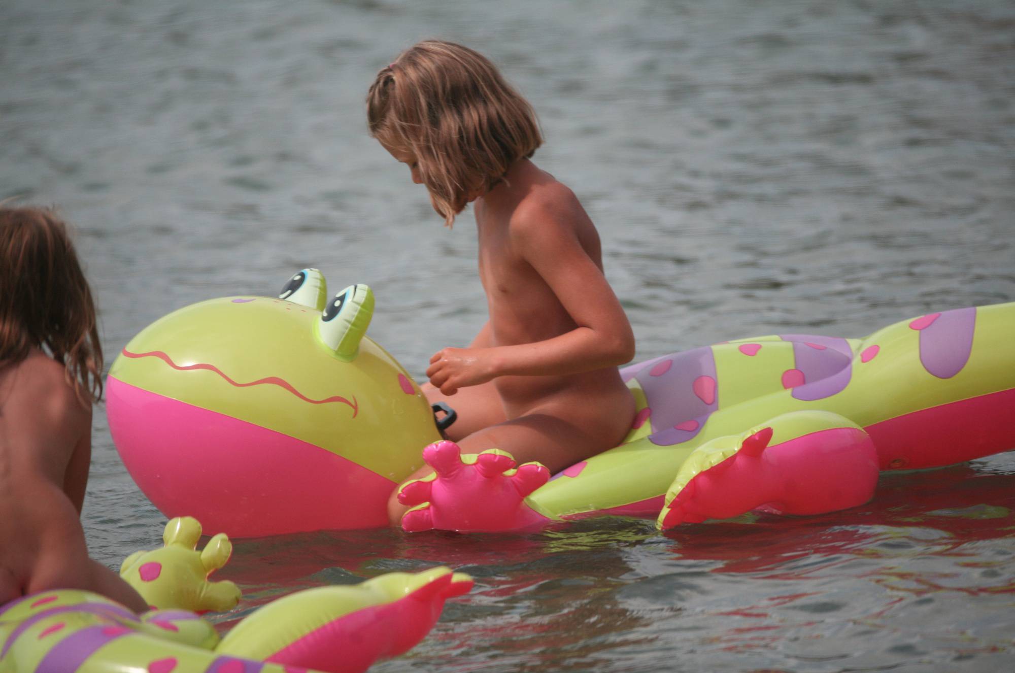 Purenudism Pics Nudist Kids On Floatables - 1