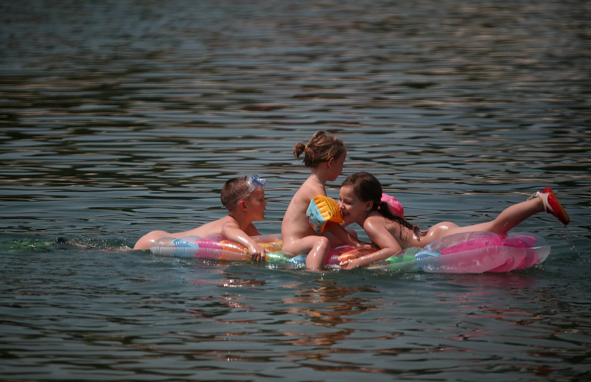 Purenudism Pics Relax Aboard A Floaty Raft - 1